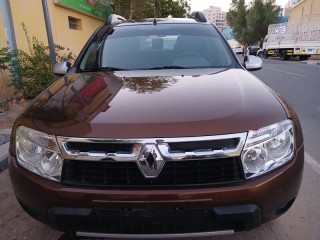ONLY 61000 KM. WELL MAINTAINED RTA PASSESD 2013 RENAULT DUSTER IN 