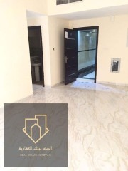 For rent in Ajman, two rooms and an annual hall Al Rashidiya area,