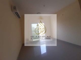 For rent in Ajman, an apartment, a room and a hall, with a balcony