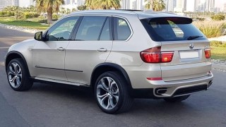 BEAUTIFUL GOLDEN BMW X5 V8 == GCC == FREE ACCIDENT == HIGHEST CATE