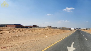 For sale industrial land with an area of 90,040 feet, Umm Al Quwai