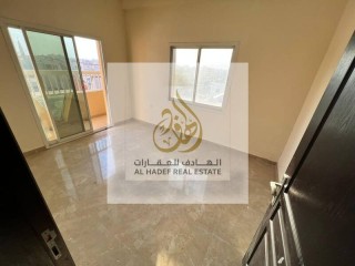 For rent in Ajman, a two-room apartment and a hall, with 2 balconi